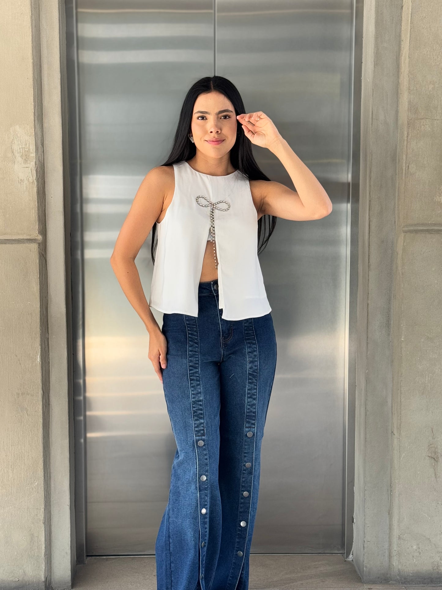 BLUSA CON MOÑO BRILLOS